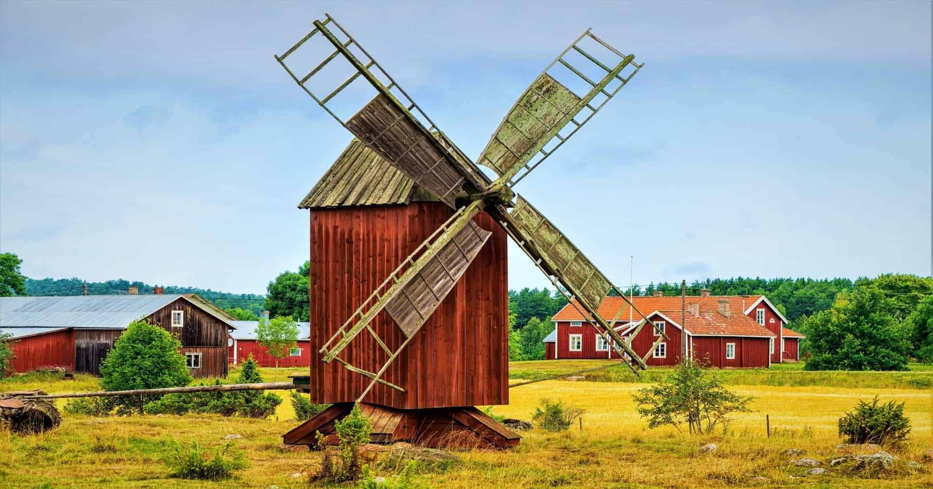 Windmill in a old vintage rural landscape. From the island Åland, Finland