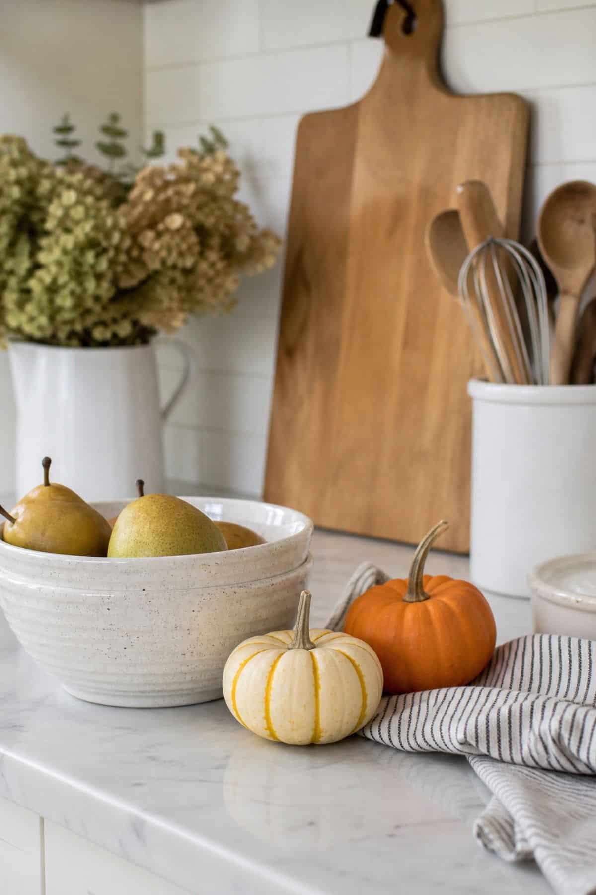 Pumpkin Kept Small shown as a realistic Pretty Wild World image for 17 Fall Kitchen Decor Ideas That Work in Real Life.