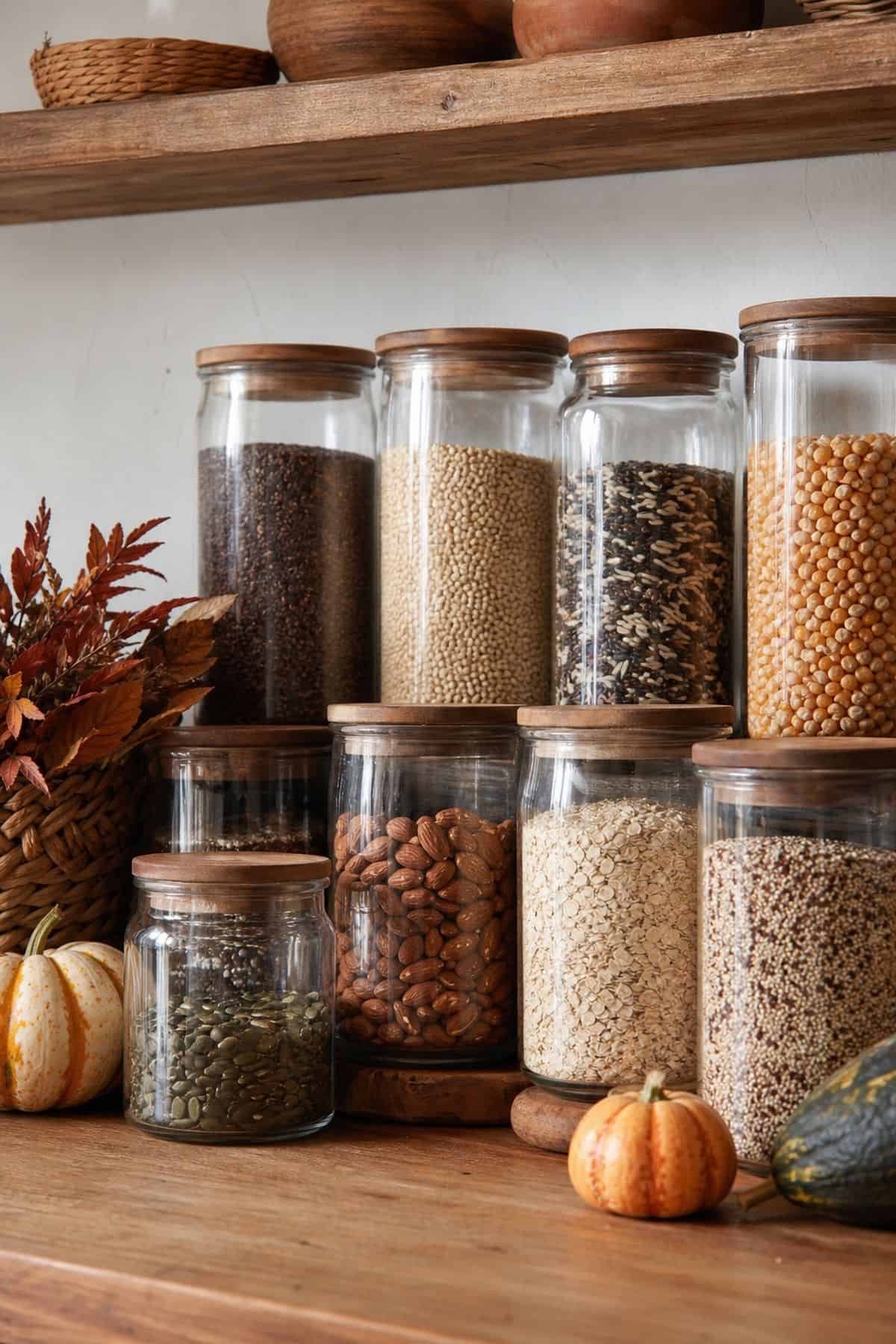 Pantry Jar Refresh shown as a realistic Pretty Wild World image for 17 Fall Kitchen Decor Ideas That Work in Real Life.