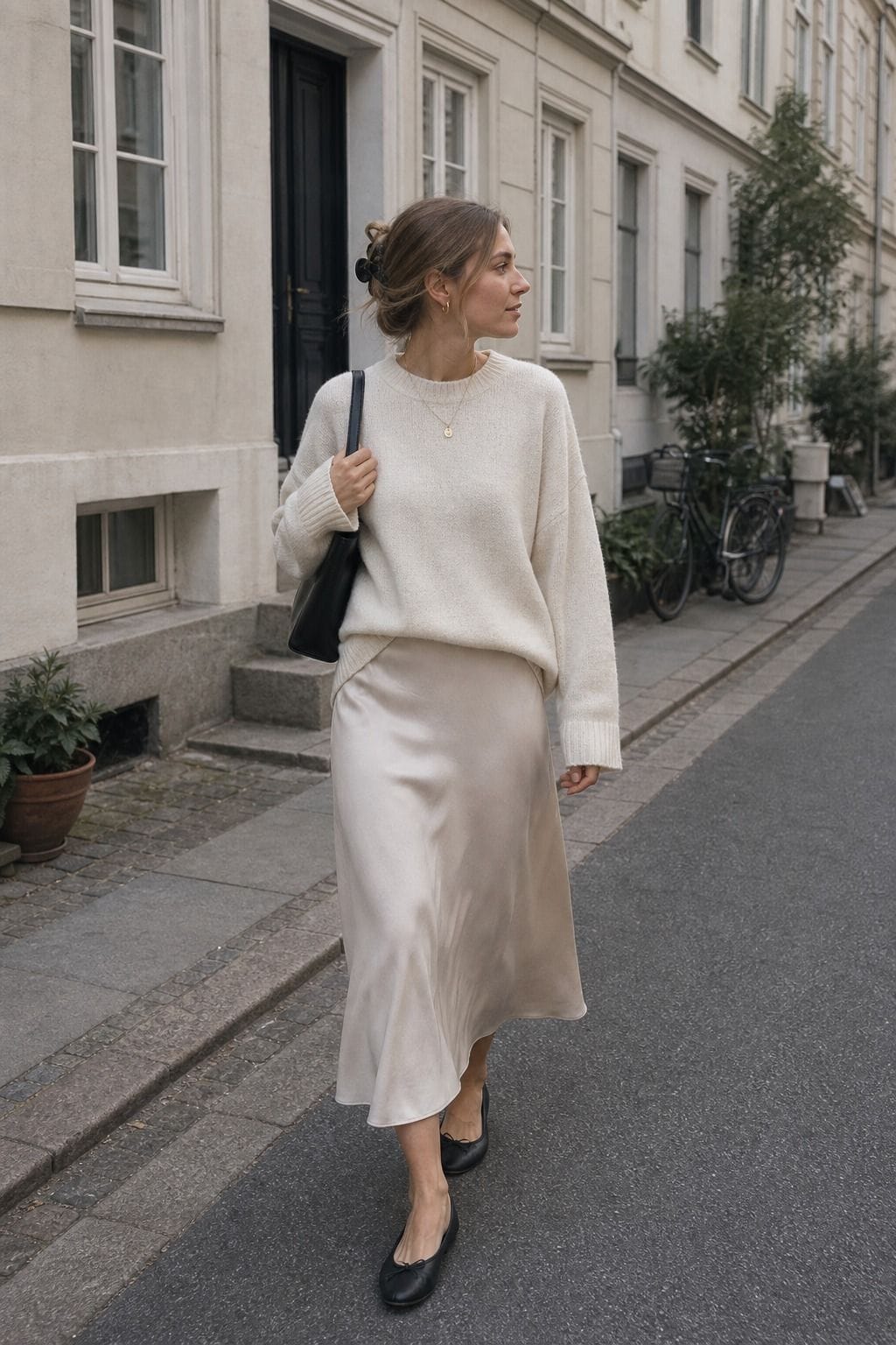 Cream Sweater over a Slip Skirt styled as a Copenhagen spring outfit for Pretty Wild World.
