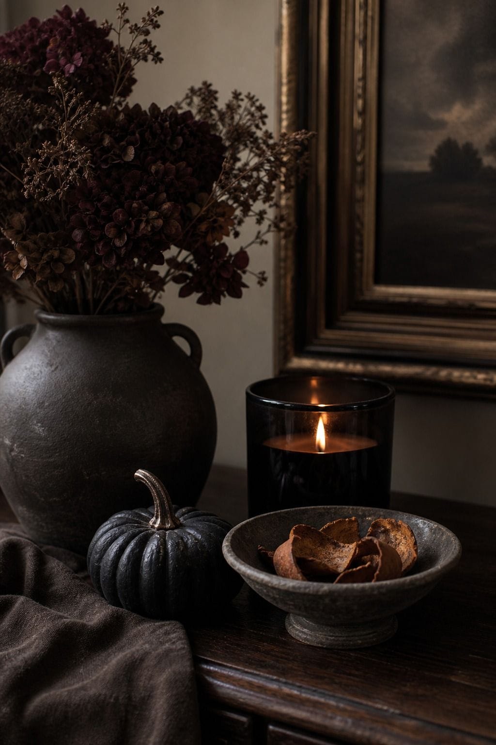 Subtle scented candle styled for elegant Halloween decor