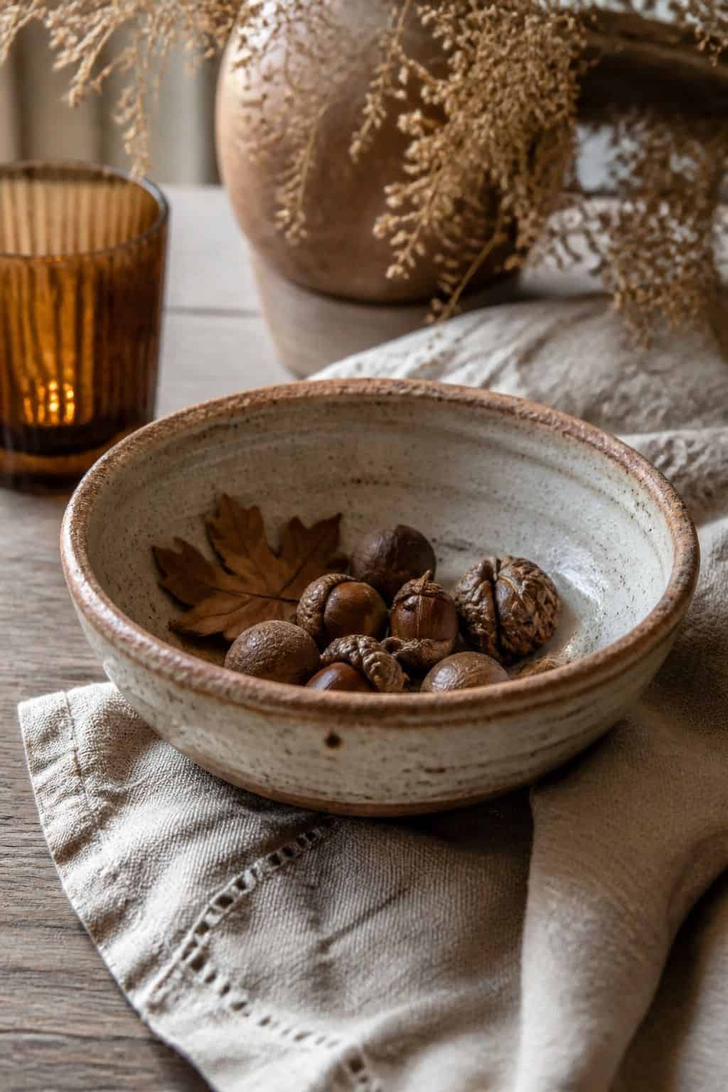 Handmade Ceramic Bowl shown as a realistic Pretty Wild World image for 19 Boho Fall Decor Ideas for a Warm Layered Home.