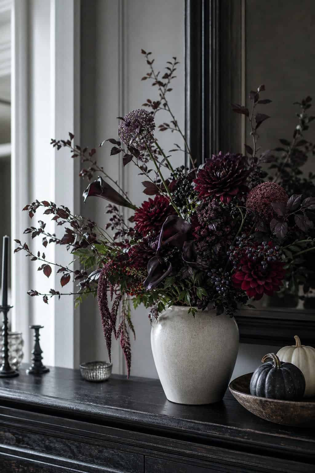 Dark Flowers in a Vase shown as a realistic Pretty Wild World image for 15 Simple Halloween Decor Ideas That Look Stylish Fast.