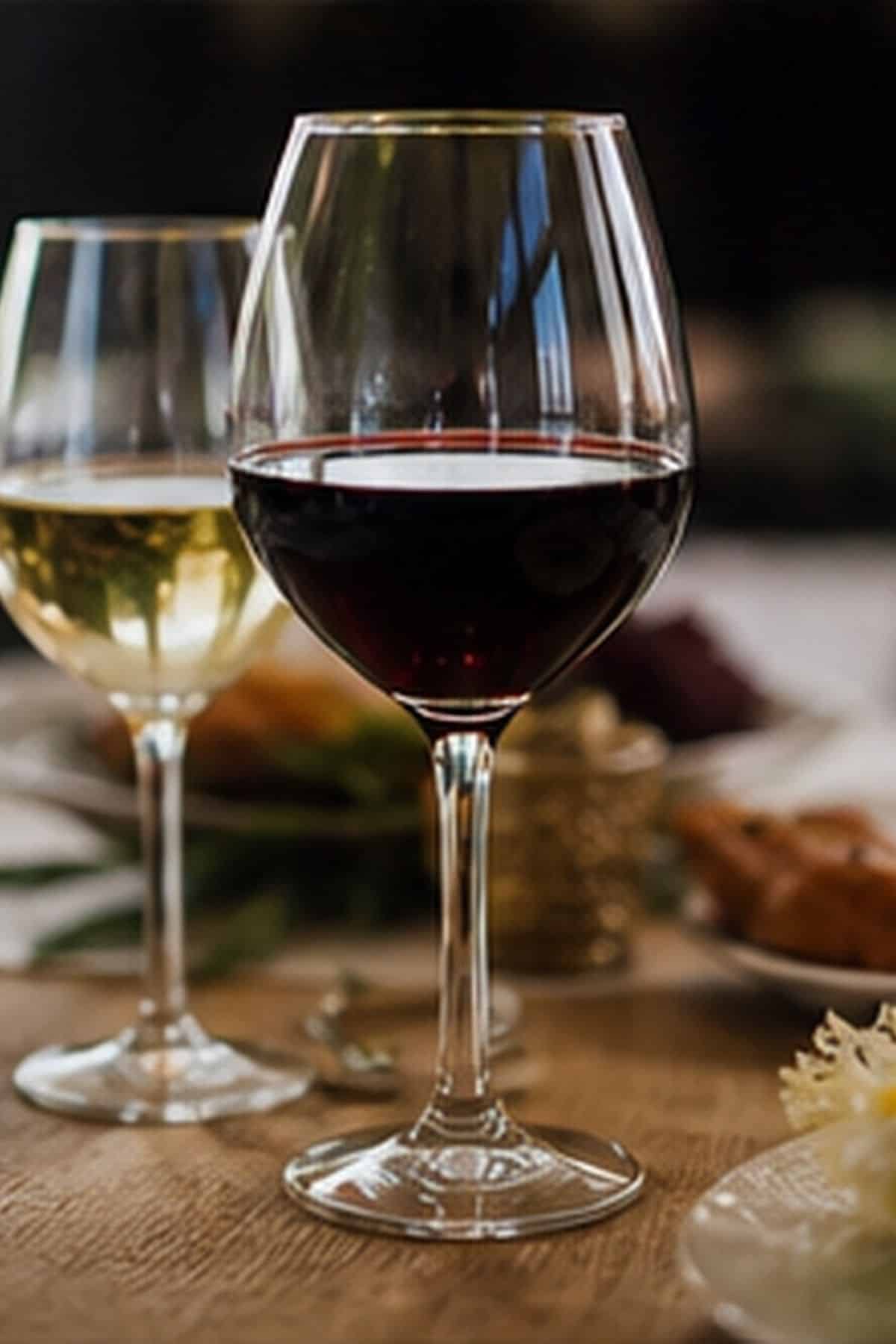 Wine Glass Edit shown as a realistic Pretty Wild World image for 18 Thanksgiving Table Setting Ideas That Feel Warm and Effortless.