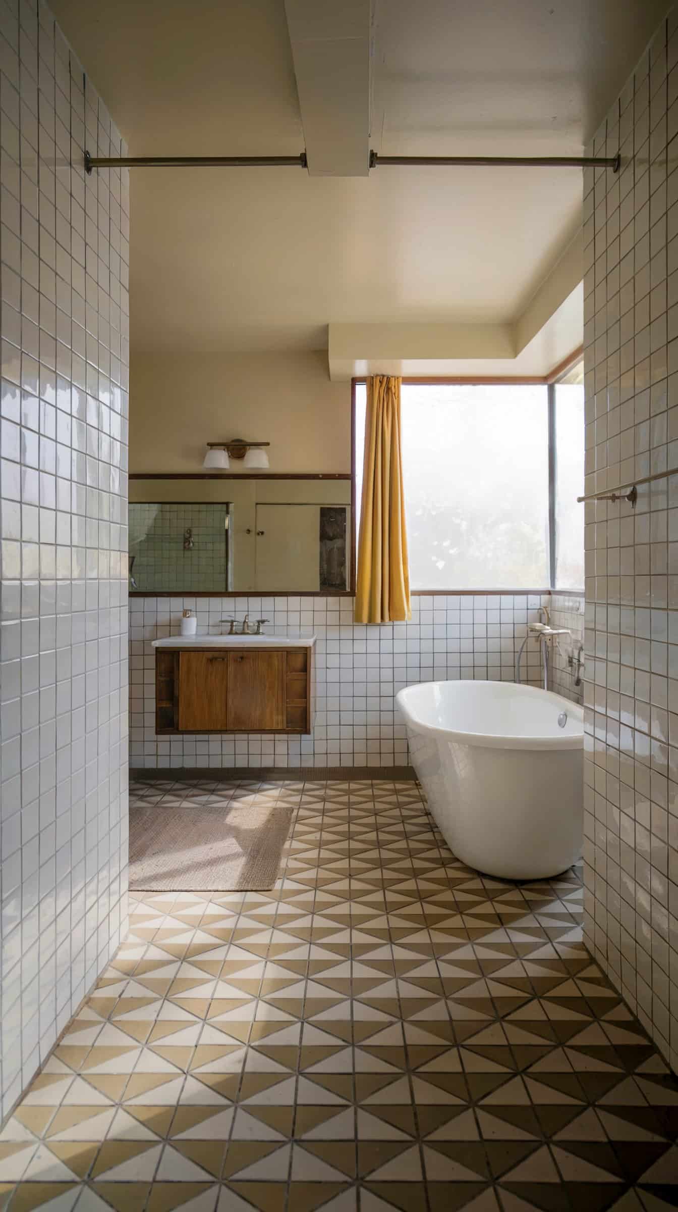 Upgrade your space with these mid-century modern bathroom ideas! Discover how to blend vintage charm with sleek, functional design for a timeless look.