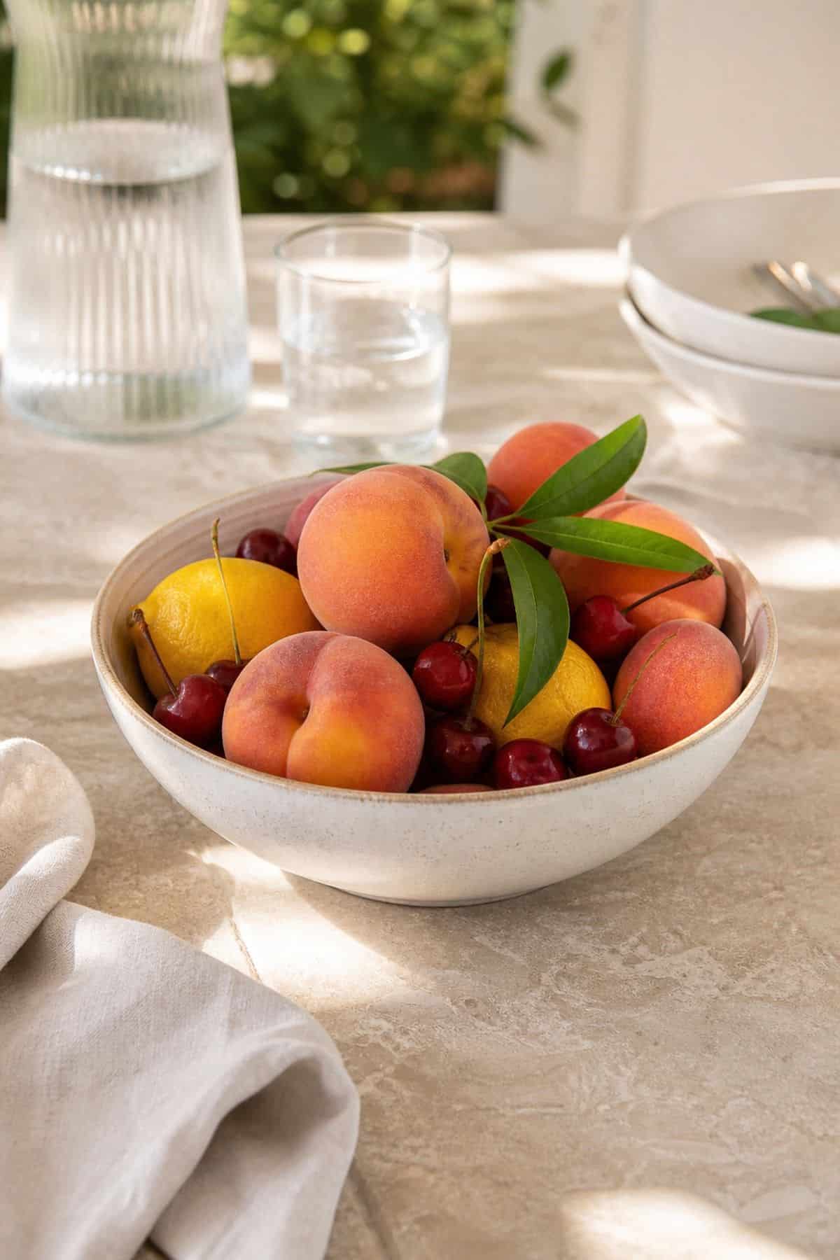 Fruit Bowl Color shown as a realistic Pretty Wild World image for 20 Summer Home Decor Ideas for a Light Breezy Refresh.