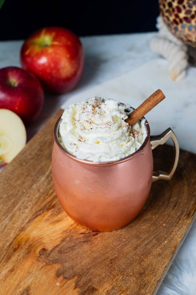 Source: <a href="https://www.queenbeemixology.com/cocktails/caramel-apple-mule/">Queen Bee Mixology</a>
