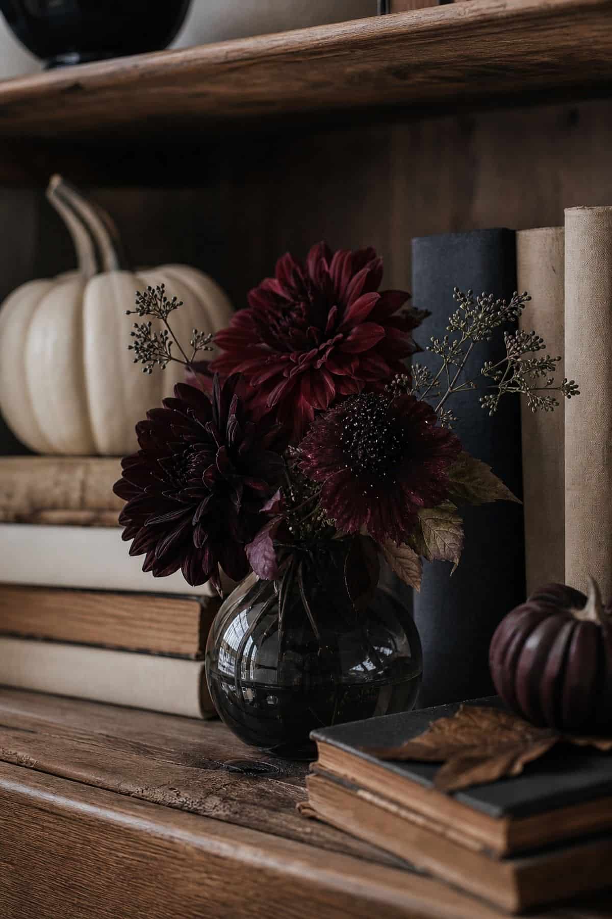 Dark Flowers in a Small Vase shown as a realistic Pretty Wild World image for 17 Halloween Shelf Decor Ideas for a Moody Collected Display.