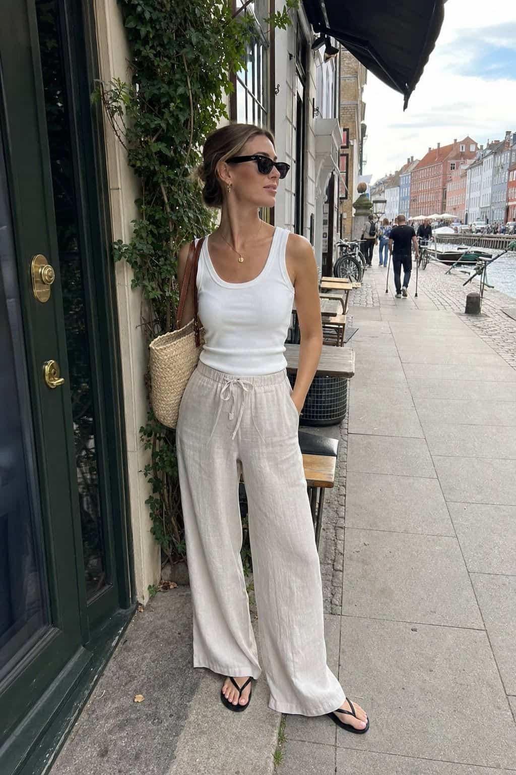 Linen Trousers with a Tank styled as a Copenhagen summer outfit idea from Pretty Wild World.