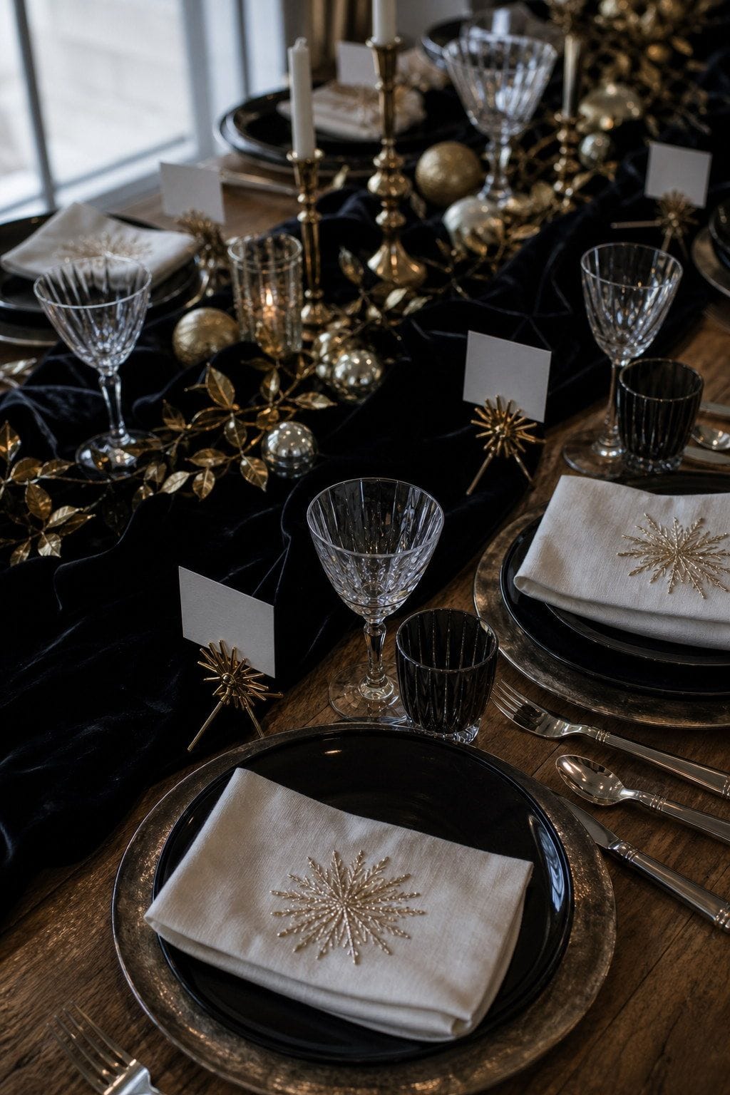metallic place cards styled on a New Year's Eve dinner table