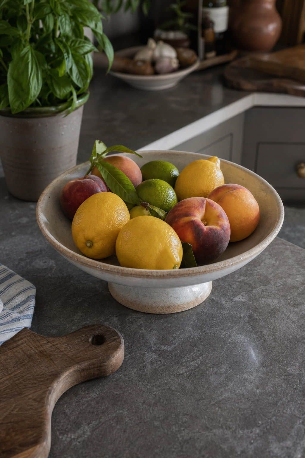 Summer kitchen decor with pedestal fruit bowl