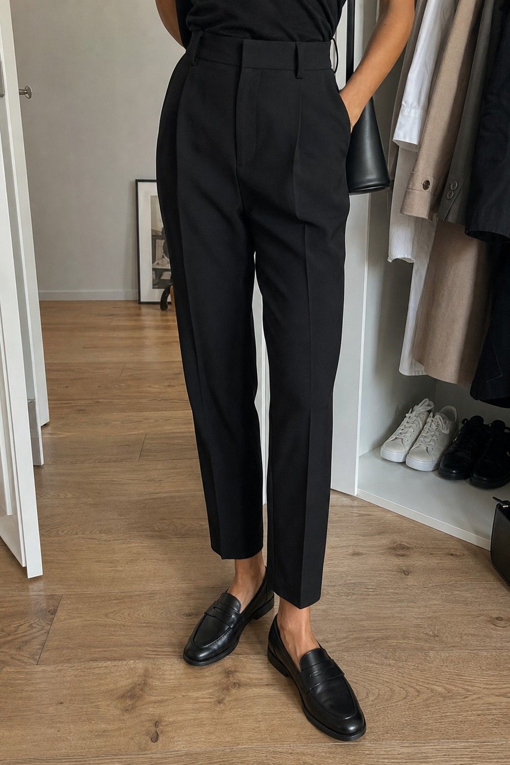Black Loafers shown as a realistic Pretty Wild World image for 21 Basic Clothes Essentials That Make Getting Dressed Easier.