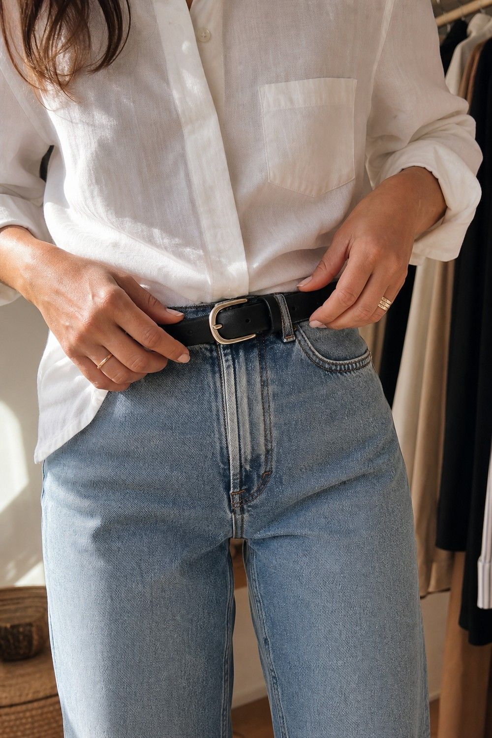 Minimal Leather Belt shown as a realistic Pretty Wild World image for 21 Basic Clothes Essentials That Make Getting Dressed Easier.
