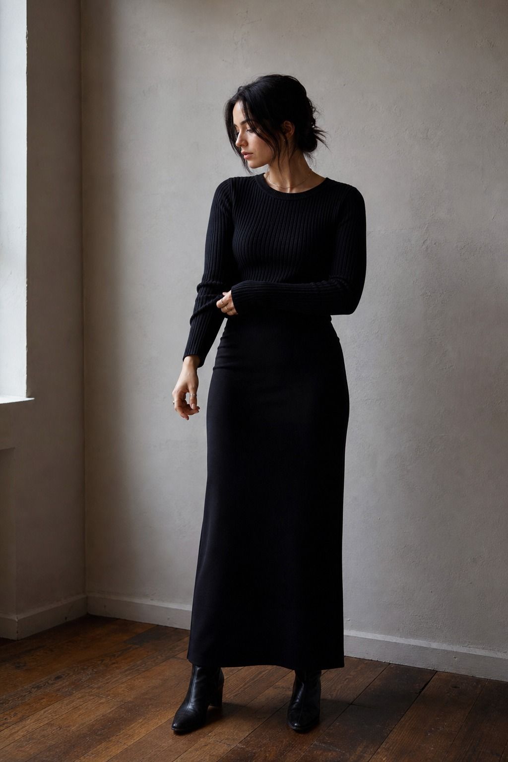 Column Skirt with a Ribbed Knit shown as a realistic Pretty Wild World image for 17 Clean Goth Outfit Ideas That Master the Minimalist Dark Aesthetic.
