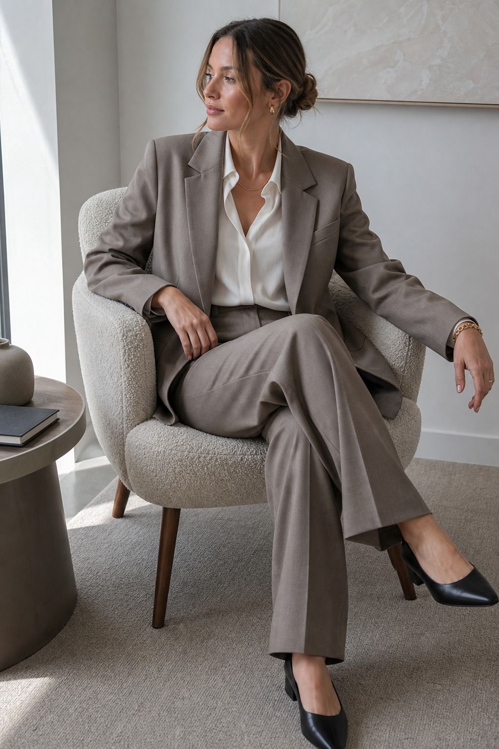 Women's corporate capsule wardrobe idea featuring relaxed suit set for polished work outfits.