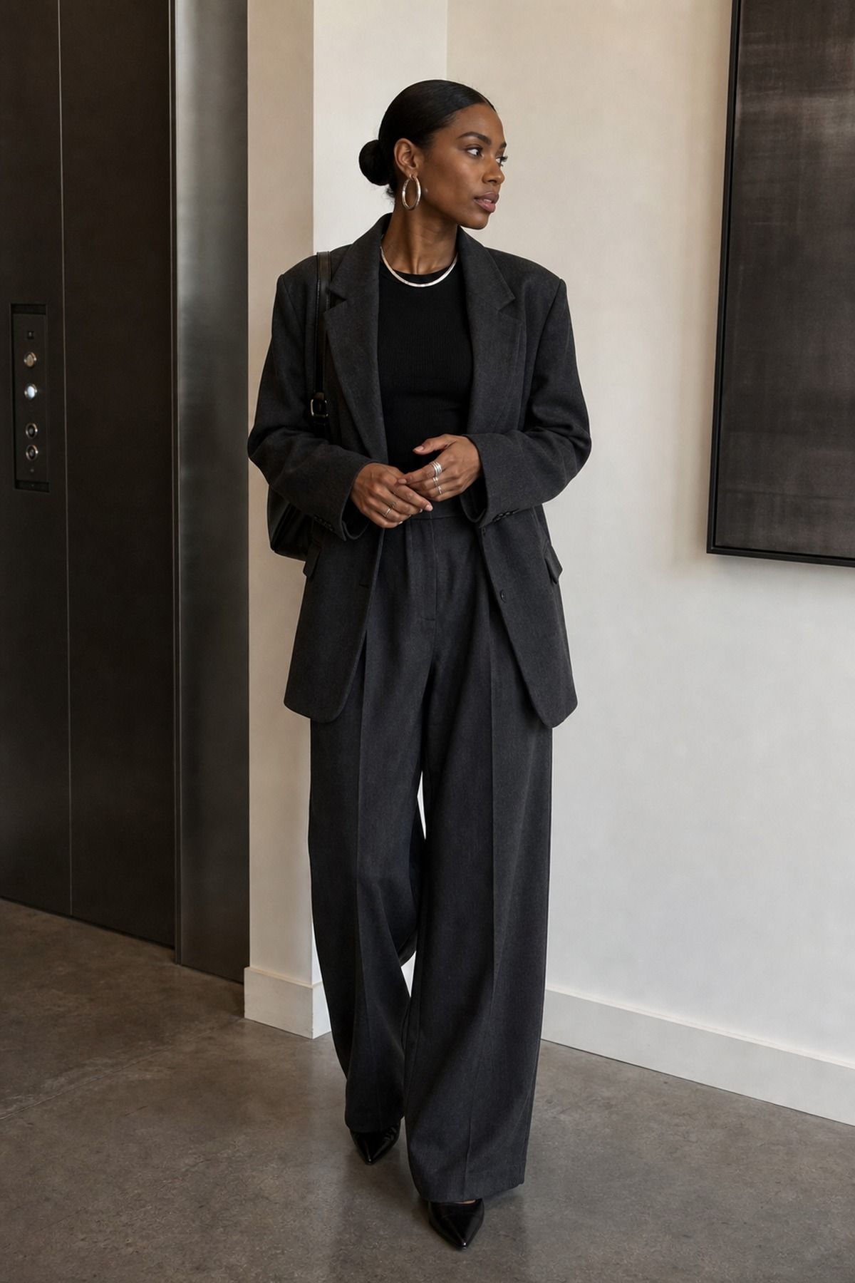 Soft Suiting with Silver Jewelry shown as a realistic Pretty Wild World image for 19 Dark Feminine Outfit Ideas That Balance Softness and Edge.