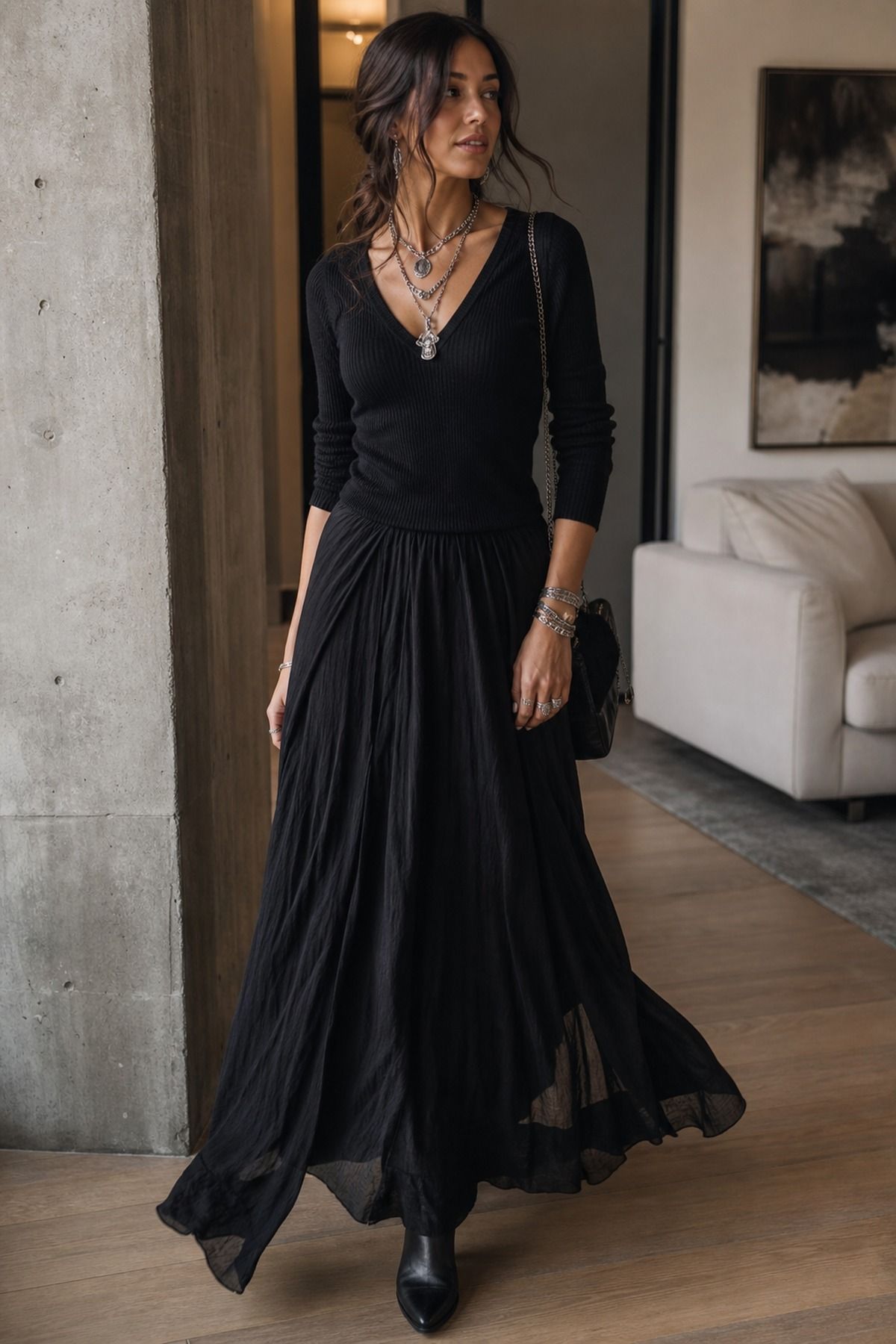 Black Maxi Skirt with Silver Jewelry shown as a realistic Pretty Wild World image for 19 Dark Romantic Outfit Ideas with Moody, Feminine Drama.