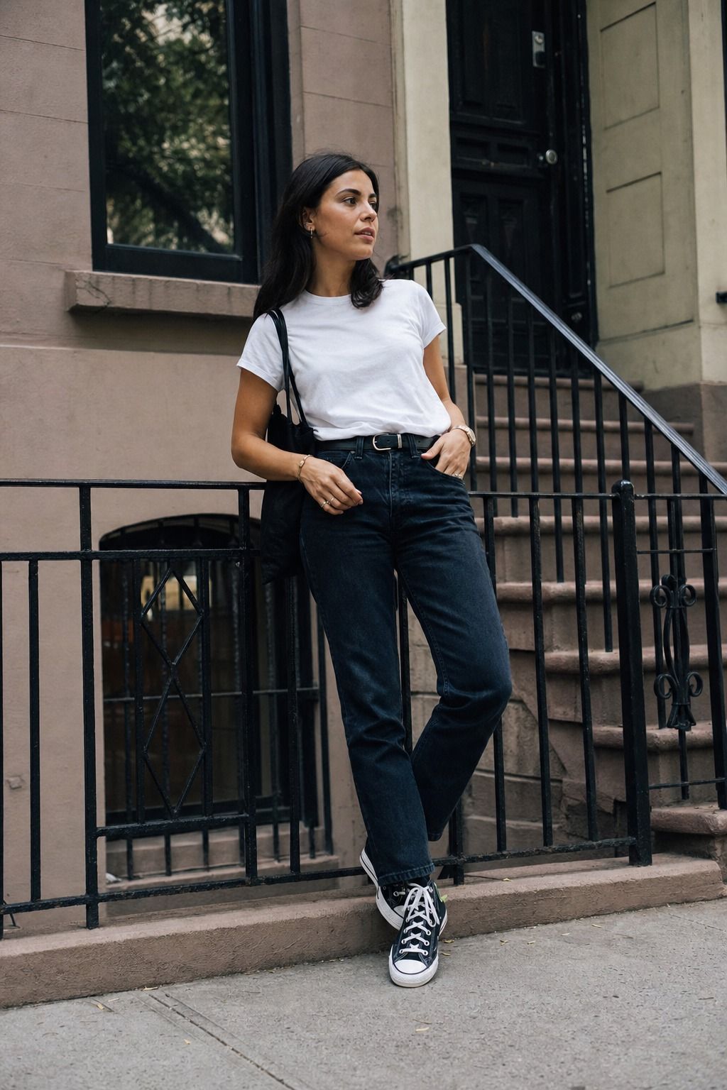 White Tee with Dark Denim shown as a realistic Pretty Wild World image for 17 Downtown Outfit Ideas That Nail the City-Cool Aesthetic.