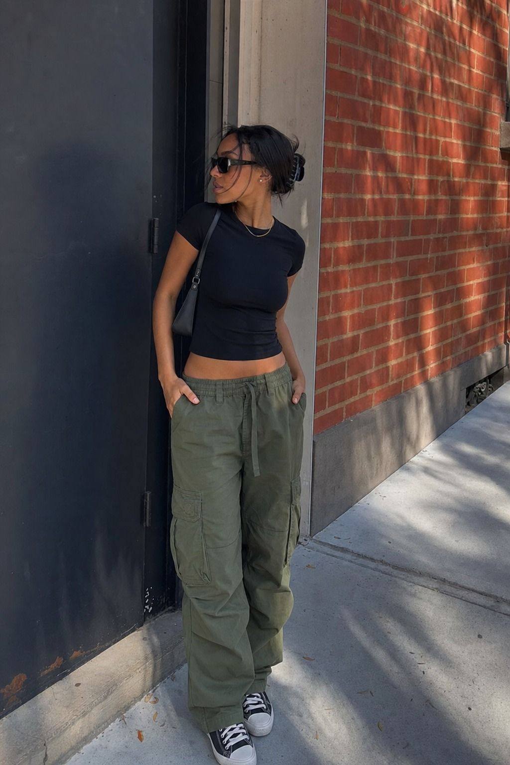 Cargo Pants with a Fitted Top shown as a realistic Pretty Wild World image for 17 Downtown Outfit Ideas That Nail the City-Cool Aesthetic.
