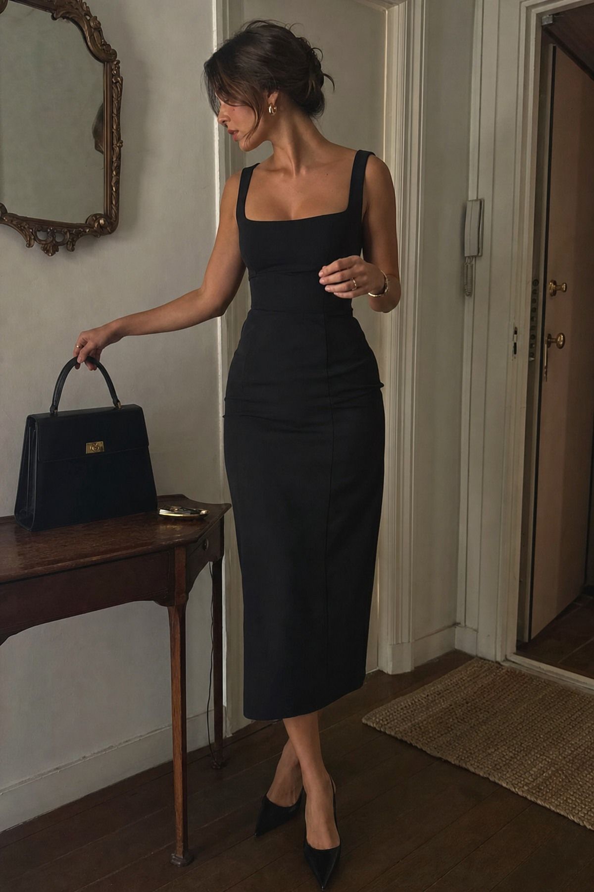 Black Midi Dress with Pointed Shoes shown as a realistic Pretty Wild World image for 17 Femme Fatale Aesthetic Outfit Ideas with Mystery, Polish, and Allure.