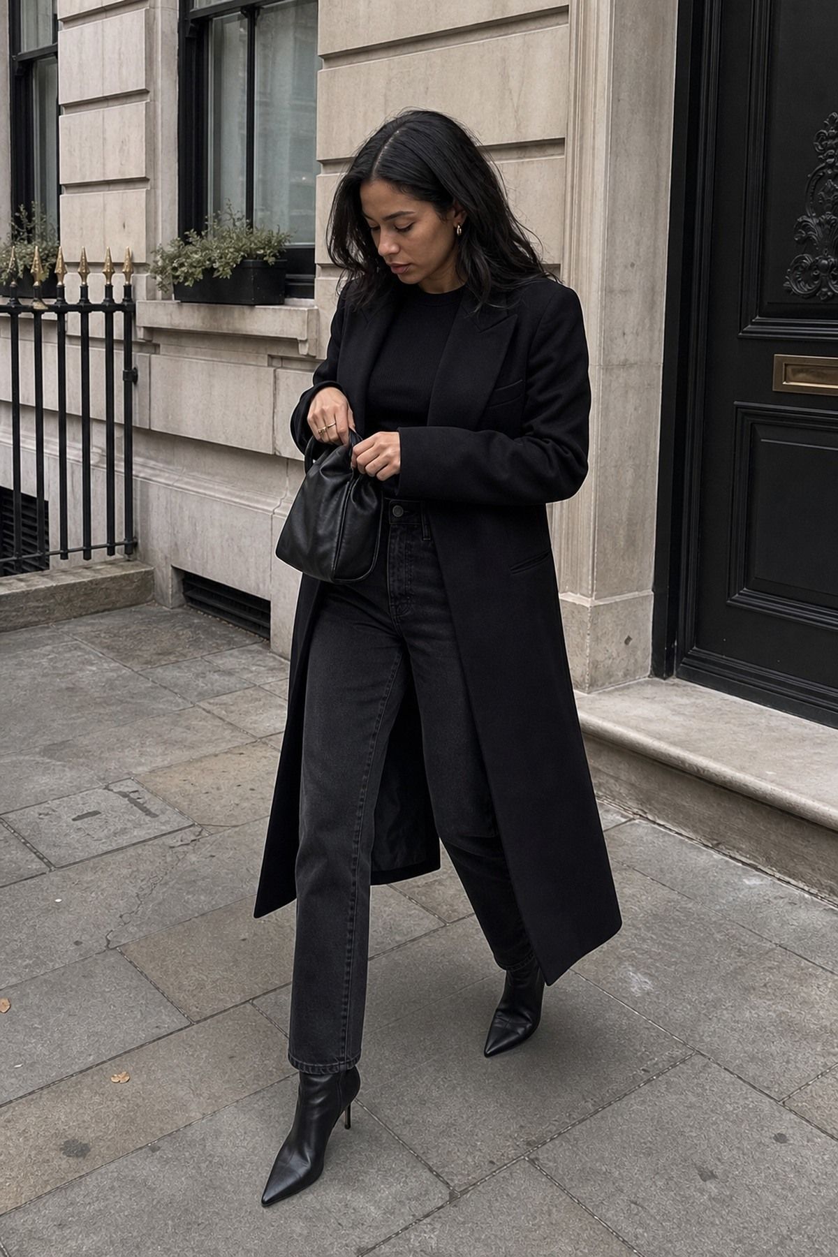 Black Jeans with a Sharp Coat shown as a realistic Pretty Wild World image for 17 Femme Fatale Aesthetic Outfit Ideas with Mystery, Polish, and Allure.