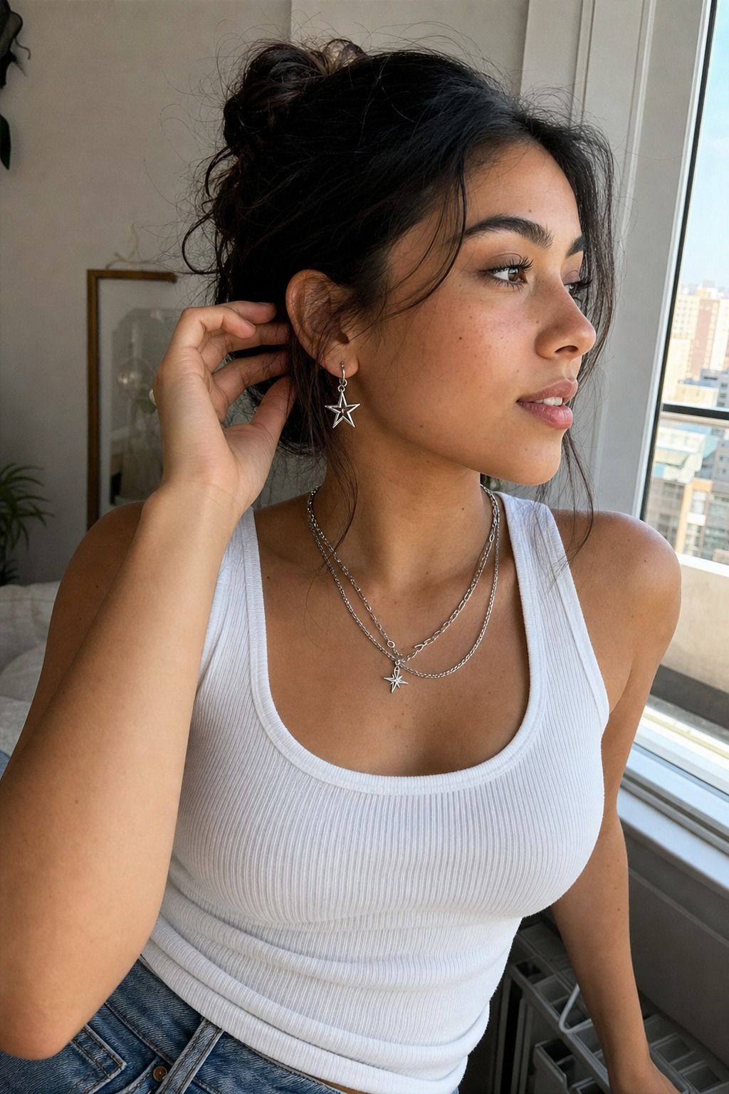 Star Earrings with a White Tank shown as a realistic Pretty Wild World image for 17 Stargirl Outfit Ideas That Bring the Y2K Celestial Aesthetic to Life.