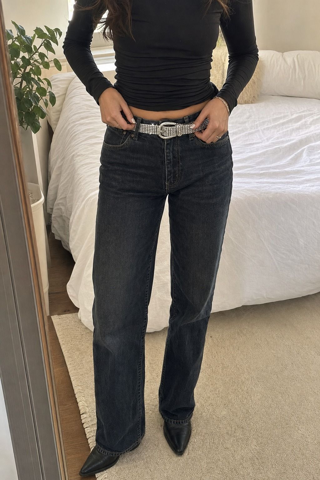 Rhinestone Belt with Dark Denim shown as a realistic Pretty Wild World image for 17 Stargirl Outfit Ideas That Bring the Y2K Celestial Aesthetic to Life.