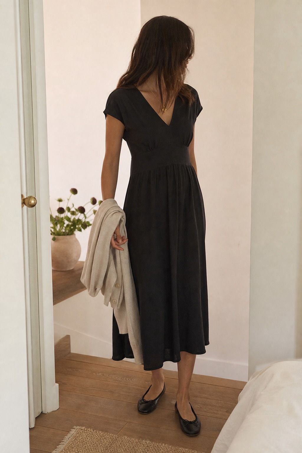Midi Dress with Ballet Flats shown as a realistic Pretty Wild World image for 19 Basic Minimalist Outfit Ideas That Make Getting Dressed Easier.