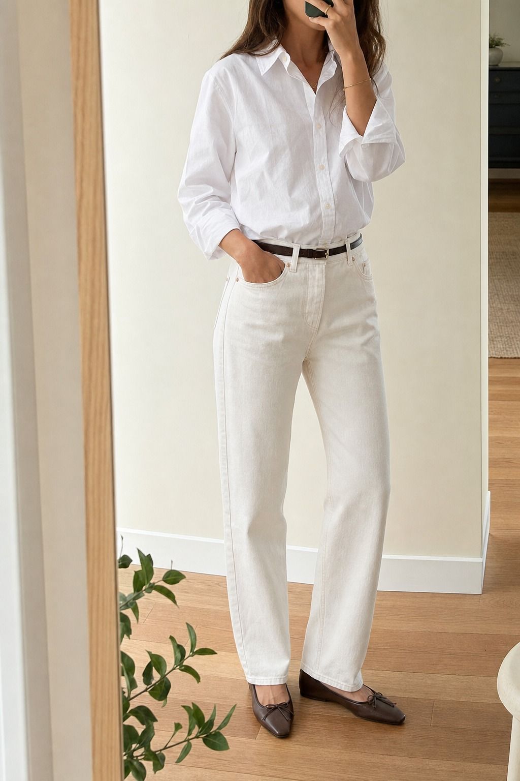 White Shirt with a Minimal Belt shown as a realistic Pretty Wild World image for 19 Basic Minimalist Outfit Ideas That Make Getting Dressed Easier.