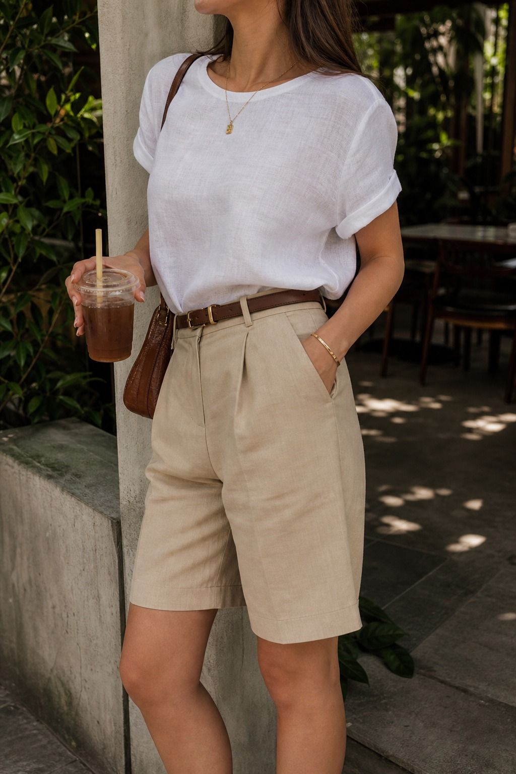 Bermuda Shorts With a Tucked Linen Tee shown as a realistic Pretty Wild World image for 15 Bangkok Outfit Ideas.
