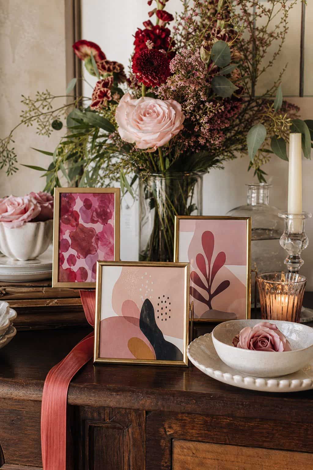 Style a soft entry table shown as a realistic Pretty Wild World image for 16 Mother's Day Home Decor Ideas for a Thoughtful Spring Celebration.