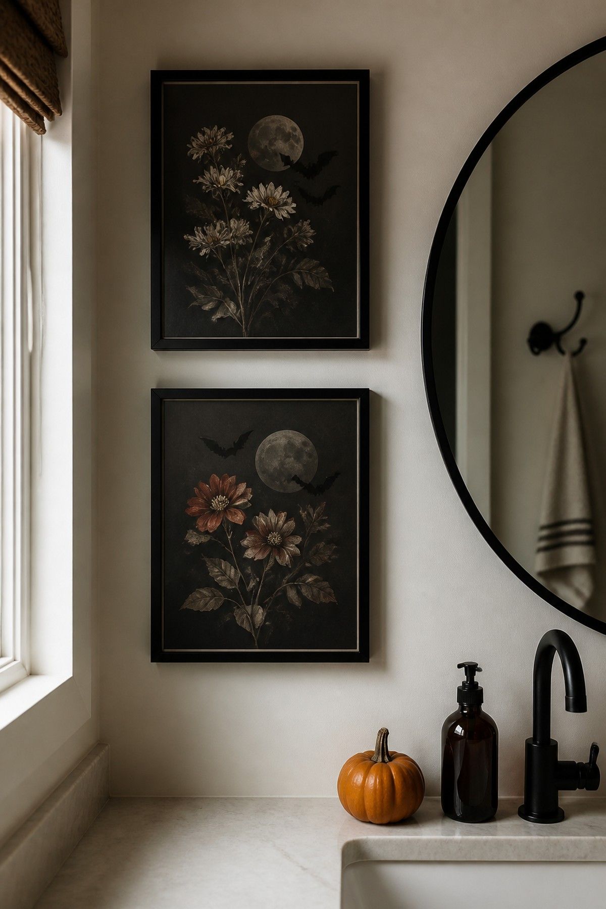 Moody Halloween botanical bathroom art above a vanity with black accents.